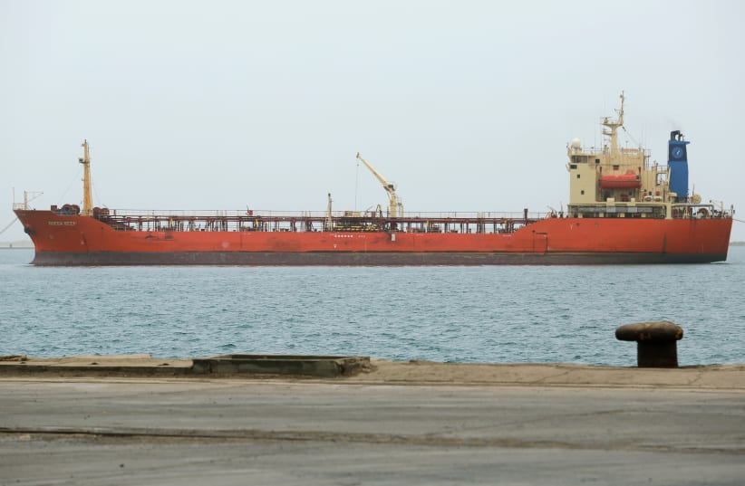  A ship is pictured at the Red Sea port of Hodeidah, Yemen August 5, 2018. (photo credit: ABDULJABBAR ZEYAD/REUTERS)