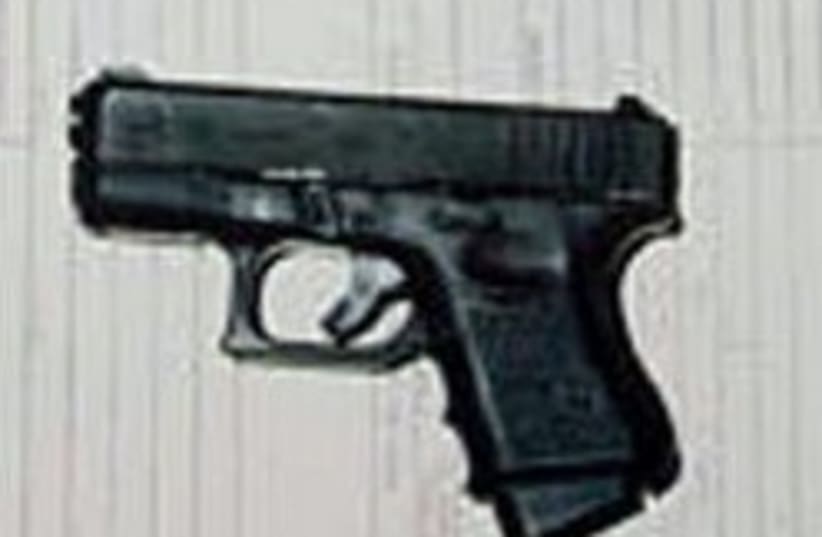 handgun pistol glock 248 88 (photo credit: AP)