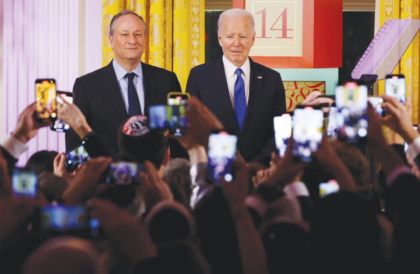  US SECOND GENTLEMAN Doug Emhoff and President Joe Biden host a Hanukkah reception at the White House last week.  (photo credit: Chip Somodevilla/Reuters)