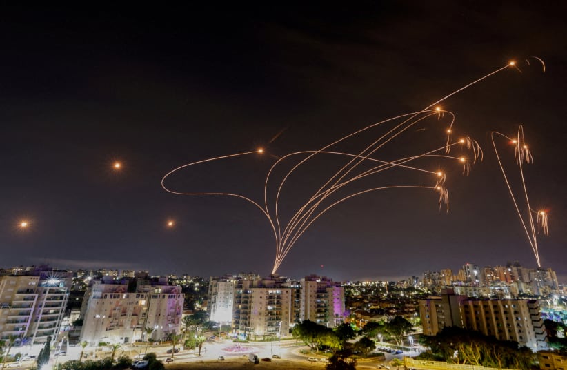  Israel's Iron Dome anti-missile system intercepts rockets launched from the Gaza Strip, as seen from the city of Ashkelon, Israel, October 9, 2023 (photo credit: REUTERS/AMIR COHEN)