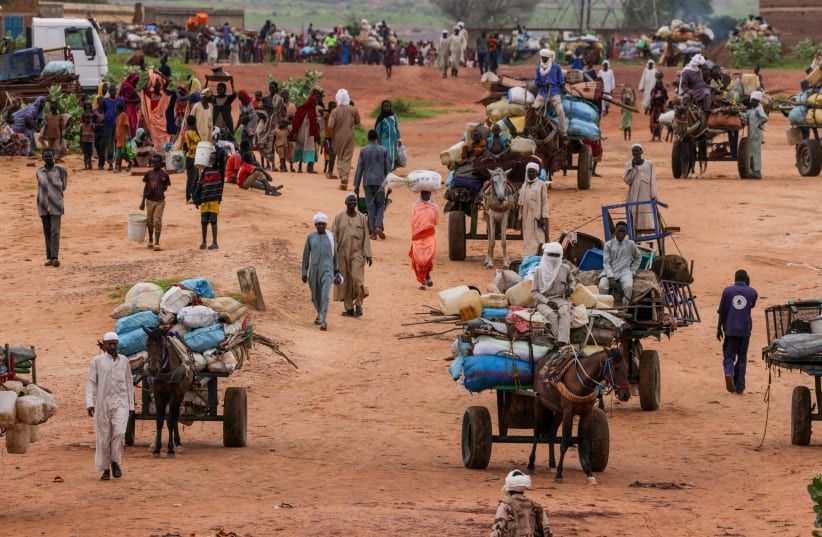  People fleeing the violence in West Darfur, cross the border into Adre, Chad, August 4, 2023. (photo credit: REUTERS/ZOHRA BENSEMRA)