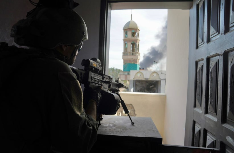  IDF soldiers operate in the Gaza Strip on December 21, 2023 (photo credit: IDF SPOKESPERSON'S UNIT)