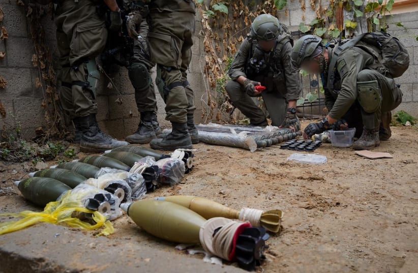 IDF soldiers operate in Gaza's Khan Yunis area on December 21, 2023 (photo credit: IDF SPOKESPERSON'S UNIT)