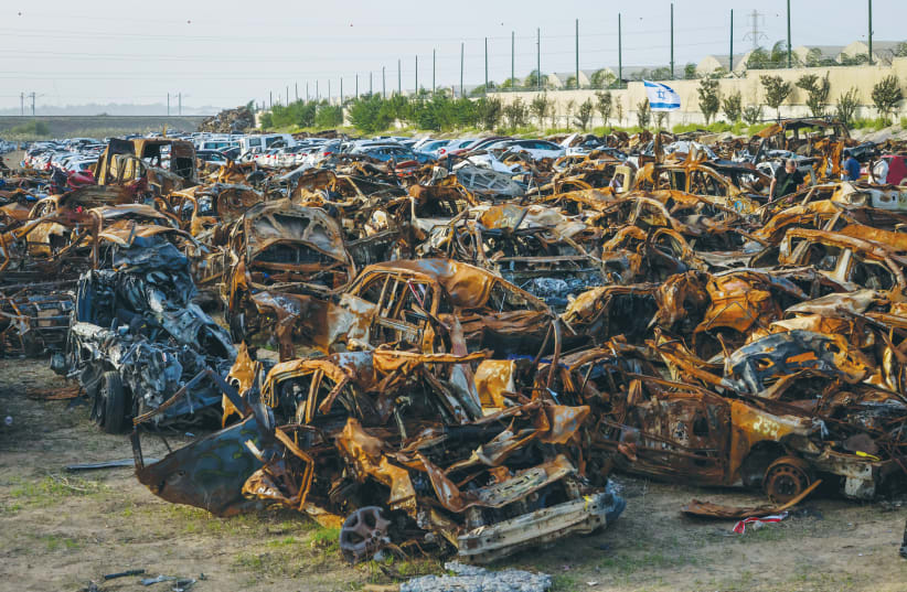  CARS DESTROYED by Hamas in its massacre in southern Israel on October 7: Hamas only beat Hezbollah to the punch, warns the writer.  (photo credit: YOSSI ZAMIR/FLASH90)