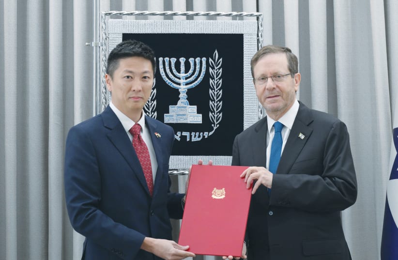  IAN MAK, Singapore’s first resident ambassador to Israel, presents his credentials to President Isaac Herzog.  (photo credit: Amos Ben Gershom – GPO)