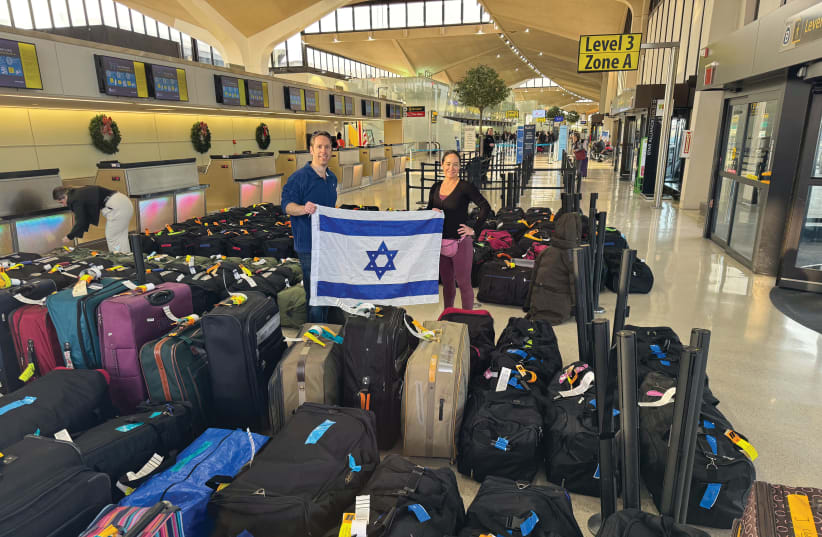  ONE NIGHT’S load of duffel bags awaits processing at Newark International Airport. (photo credit: The Bergen County Support for Israel & IDF)