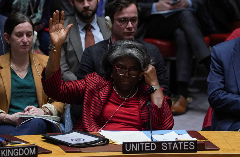  US Ambassador to the United Nations Linda Thomas-Greenfield votes on a proposal to demand that Israel and Hamas allow aid access to the Gaza Strip during a UN Security Council meeting December 22, 2023. (photo credit: REUTERS/David Dee Delgado)