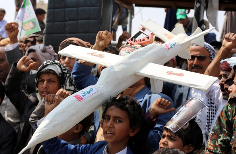  Followers of the Houthi movement carry a mock drone during a rally held to mark the Ashura in Saada, Yemen September 10, 2019. (photo credit: NAIF RAHMA / REUTERS)