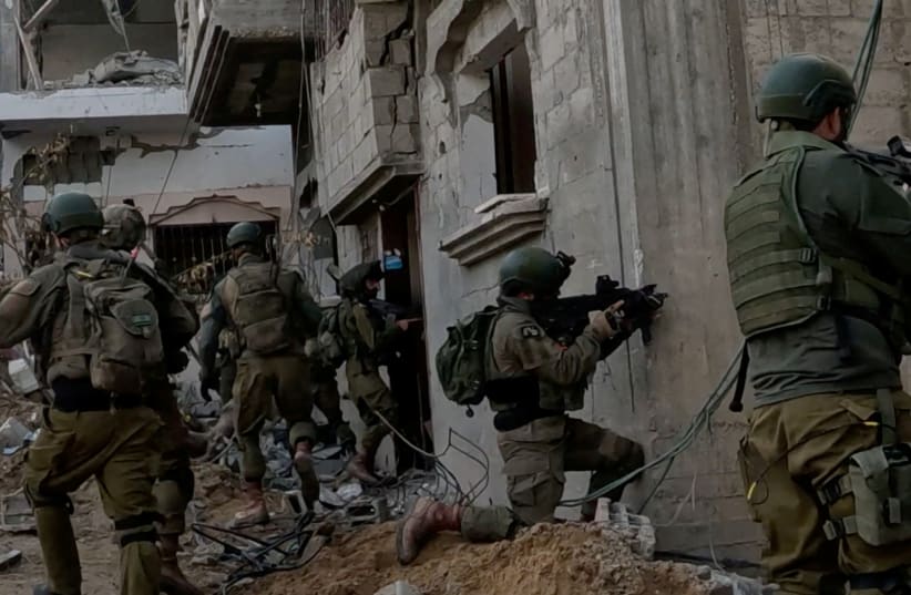  Israeli army operates in Beit Hanoun, northern Gaza, December 22, 2023 (photo credit: IDF/Handout via REUTERS)
