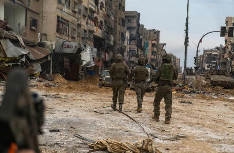  IDF soldiers operate in Gaza City's Sheikh Radwan neighborhood on December 24, 2023 (photo credit: IDF SPOKESPERSON'S UNIT)
