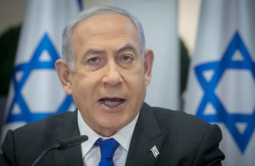 Prime Minister Benjamin Netanyahu chairs a cabinet meeting at the Kirya military base, in Tel Aviv, Israel, December 24, 2023 (photo credit: Ohad Zwigenberg/Pool via REUTERS)