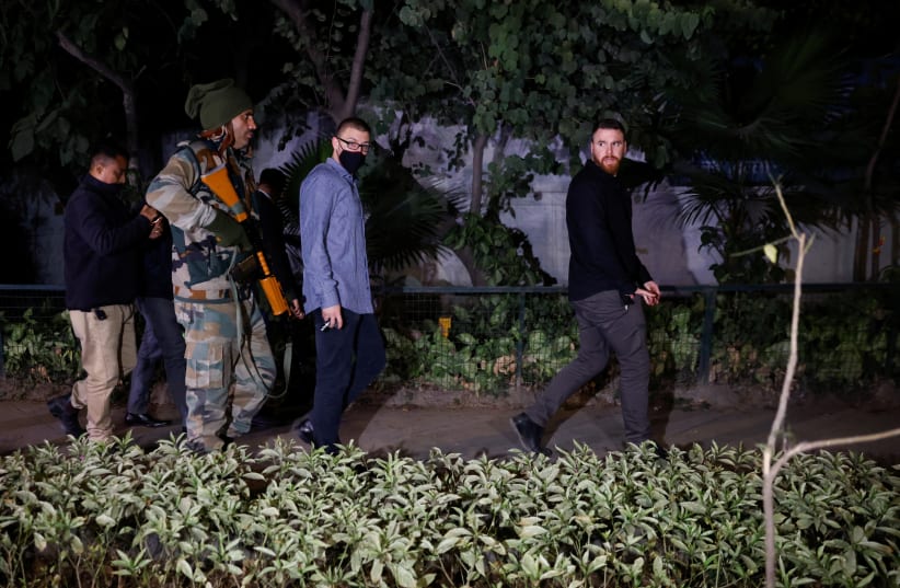 Israeli embassy officials and members of the security forces check the area, following a reported explosion nearby, in New Delhi, India, December 26, 2023. (photo credit: REUTERS/ANUSHREE FADNAVIS)