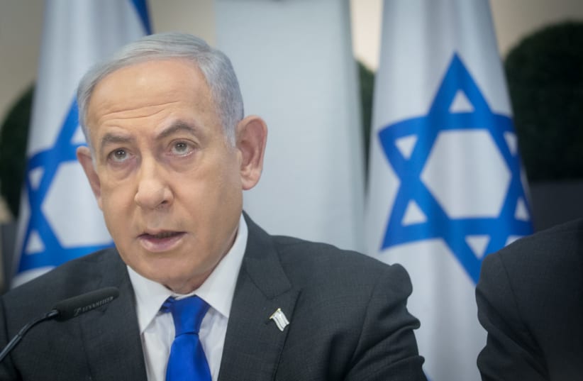  Israeli Prime Minister Benjamin Netanyahu leads a government conference at Hakirya base in Tel Aviv on December 24, 2023. (photo credit: MIRIAM ALSTER/FLASH90)