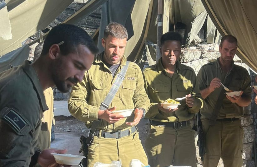  SOLDIERS ENJOY Yael Kaner’s soups. (photo credit: Yael Kaner)
