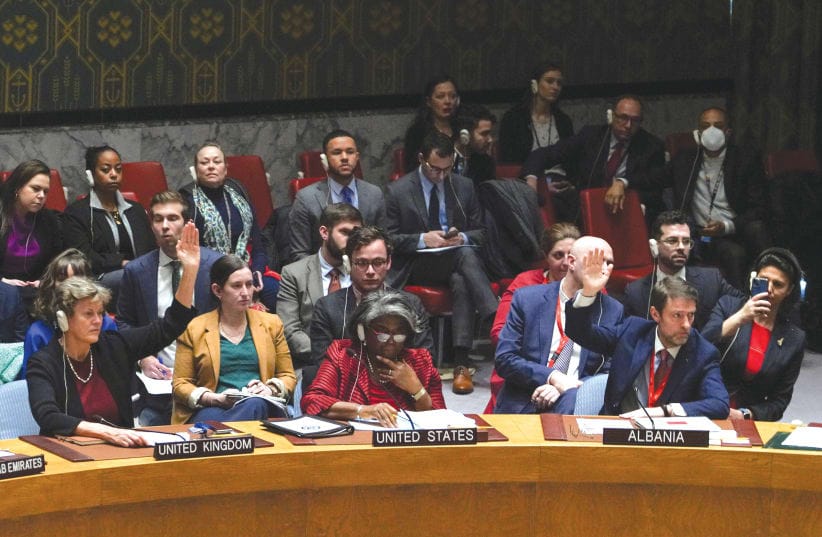  MEMBERS OF the United Nations Security Council vote on a proposal to demand that Israel and Hamas allow aid access to the Gaza Strip and set up UN monitoring of the humanitarian assistance delivered, during a meeting at the UN headquarters in New York, on December 22. (photo credit: David Dee Delgado/Reuters)