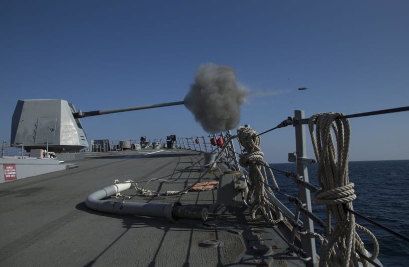 The guided-missile destroyer USS Mason (DDG 87) fires its 5-inch gun during a live-fire exercise. (photo credit: US Navy photo by Mass Communication Specialist 2nd Class Rob Aylward/Released)