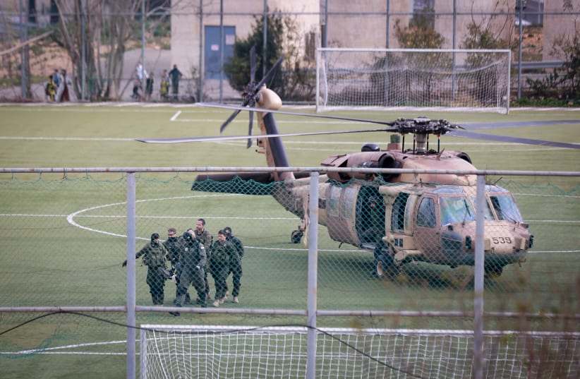 Military helicopter arrives to Shaarei Tzedek hospital  in Jerusalem, December 29, 2023 (photo credit: NOAM REVKIN FENTON/FLASH90)