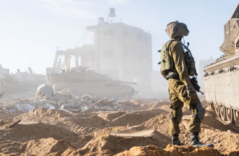 Israeli soldiers operate in the Gaza Strip on December 30, 2023 (photo credit: IDF SPOKESPERSON'S UNIT)