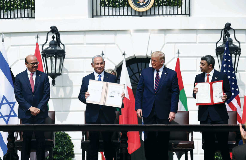  THE ABRAHAM ACCORDS signing ceremony at the White House in September 2020: It was an erroneous perception that peace agreements and normalization with our Arab neighbors could be achieved without paying any political price to our Palestinian neighbors, says the writer. (photo credit: Avi Ohayon/GPO)