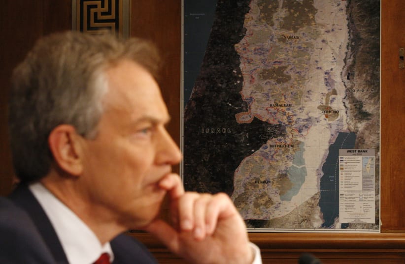 Tony Blair is pictured alongside a map of Israel and the West Bank, May 14, 2009 (photo credit: REUTERS/JASON REED)