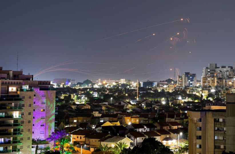  Israel's Iron Dome anti-missile system intercepts rockets launched from the Gaza Strip, as seen from Ashkelon, Israel, January 1, 2024 (photo credit: AMIR COHEN/REUTERS)