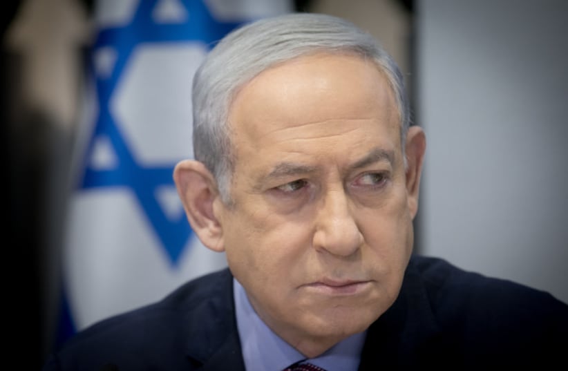  Israeli Prime Minister Benjamin Netanyahu leads a government conference at the Kirya base in Tel Aviv on December 31, 2023 (photo credit: MIRIAM ALSTER/FLASH90)