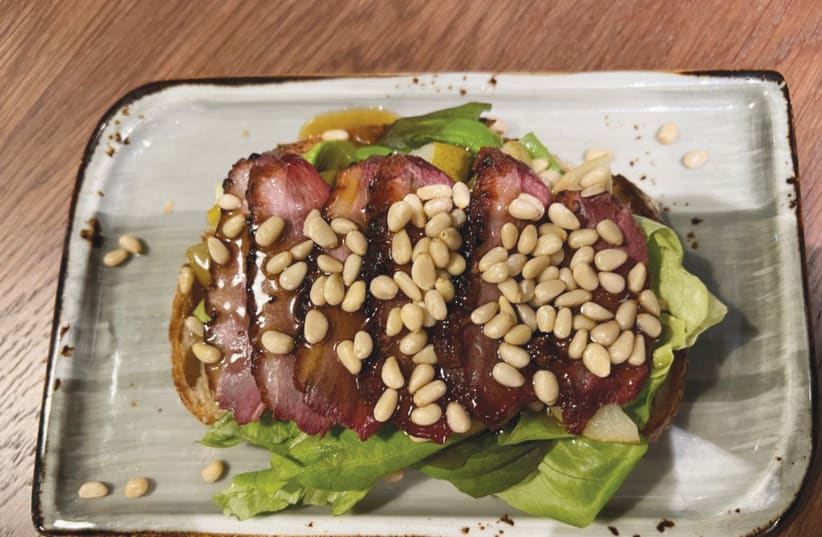  Eating smoked goose breast at Slow and Bro. (photo credit: ALEX DEUTSCH)