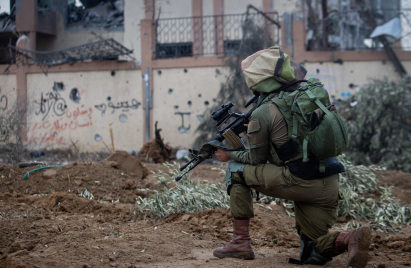  Israeli soldiers from the 646 Battalion of the Paratroopers Brigade operating in Al-Bureij camp in the central Gaza, during an Israeli military operation in the Gaza Strip, January 2, 2023. (photo credit: OREN BEN HAKOON/FLASH90)