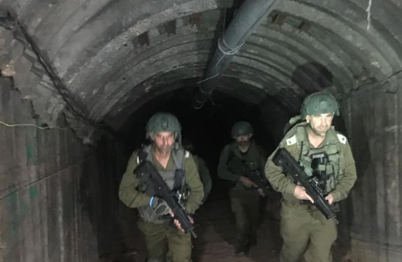  IDF soldiers operating in the tunnel used by Yahya Sinwar's brother in the Gaza Strip (photo credit: BENJAMIN WEINTHAL)