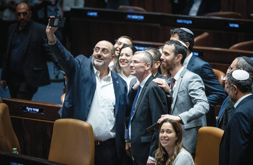  JUSTICE MINISTER Yariv Levin and coalition members celebrate the vote on the reasonableness bill in Knesset, last July. (photo credit: YONATAN SINDEL/FLASH90)