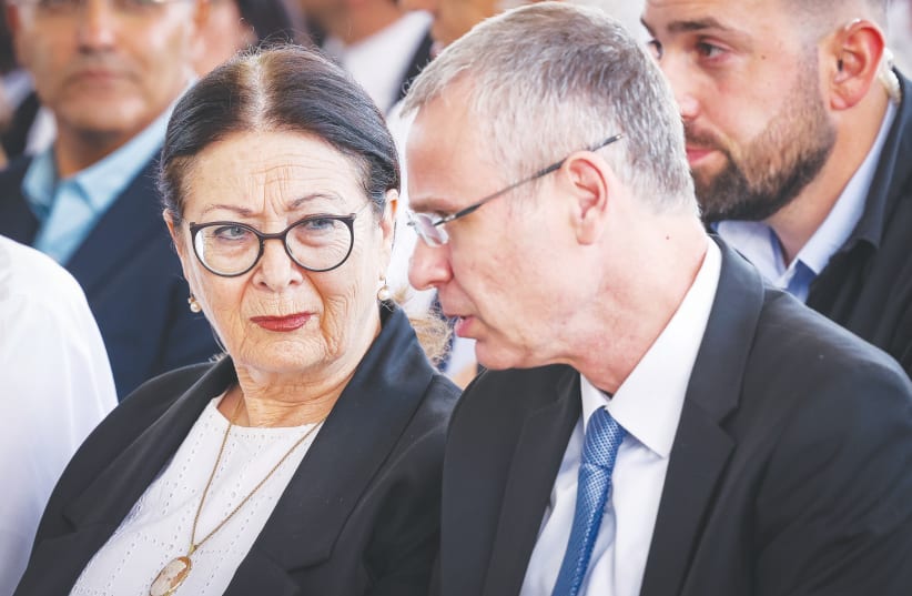  ESTHER HAYUT, president of the Supreme Court at the time, and Justice Minister Yariv Levin attend the opening of the Magistrate's Court in Safed in September (photo credit: DAVID COHEN/FLASH 90)