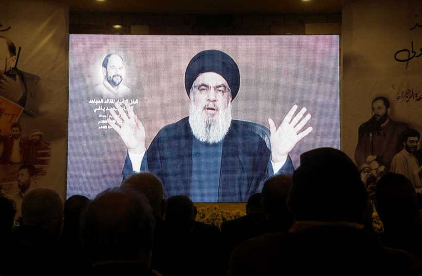  Lebanon's Hezbollah leader Sayyed Hassan Nasrallah gives a televised address at a memorial ceremony to mark one week since the passing of Mohammad Yaghi, one of the powerful armed group's figures, in Baalbek, Lebanon January 5, 2024. (photo credit: REUTERS/MOHAMED AZAKIR)