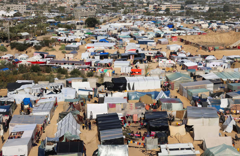  A general view of a tent camp sheltering displaced Palestinians, who fled their homes due to Israeli strikes, amid the ongoing conflict between Israel and the Palestinian terrorist group Hamas, in Rafah, southern Gaza Strip, January 3, 2024. (photo credit: REUTERS/SALEH SALEM)