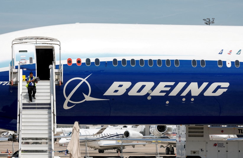  A Boeing logo is seen on a 777-9 aircraft on display during the 54th International Paris Airshow at Le Bourget Airport near Paris, France, June 18, 2023 (photo credit: REUTERS/BENOIT TESSIER)