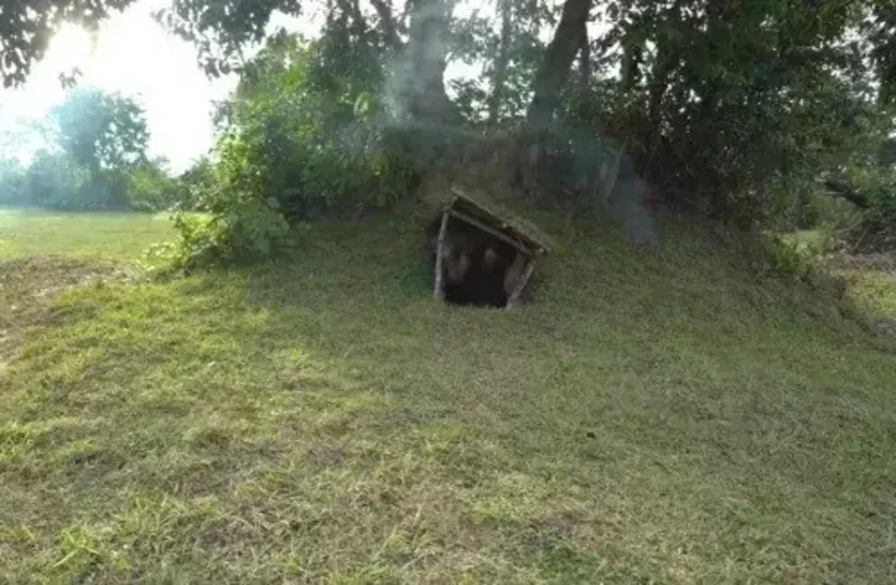  This is what it looks like when she enters the cave house she carved (photo credit: @PrimitiveSurvivalLife)
