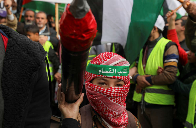  A child attends a protest in support of Palestinians in Gaza, amid the ongoing conflict between Israel and Palestinian Islamist group Hamas, in Amman, Jordan January 5, 2024.  (photo credit: REUTERS/Alaa Al-Sukhni)