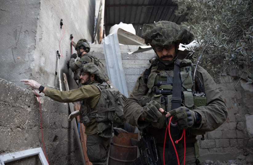  Soldiers of the Yiftah brigade prepare to destroy a tunnel in northern Gaza (photo credit: IDF SPOKESPERSON UNIT)