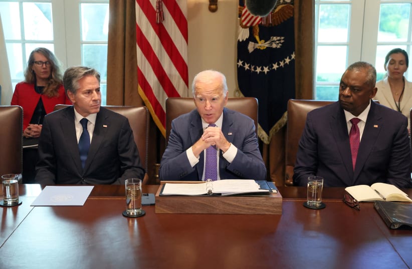  U.S. President Joe Biden, flanked by Secretary of State Antony Blinken and Secretary of Defense Lloyd Austin, makes a statement to the news media ahead of a cabinet meeting at the White House in Washington, U.S., October 2, 2023.  (photo credit: REUTERS/LEAH MILLIS)