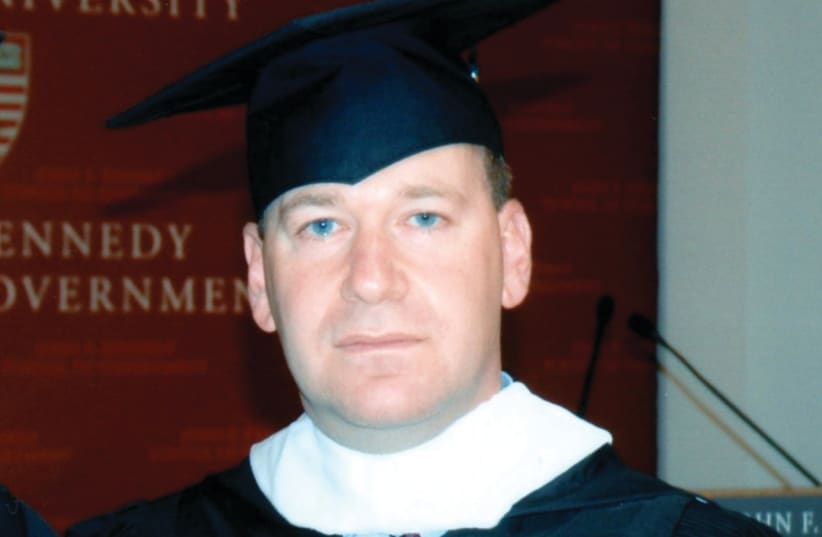 THE WRITER attends the 2004 Harvard University Commencement Ceremony.  (photo credit: Courtesy)