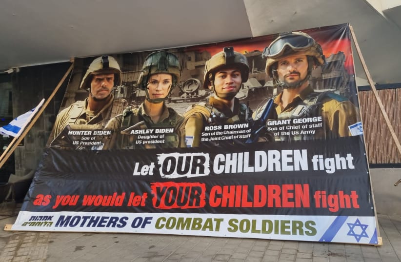 Demonstrators from the Mothers of Combat Soldiers Foundation displayed a banner showing the children of prominent US politicians as IDF soldiers in Gaza. (photo credit: Mothers of Combat Soldiers Foundation)