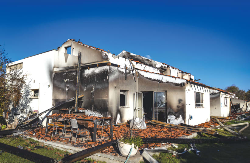  A GUTTED HOUSE in Kibbutz Be’eri, following the barbaric onslaught. As brutal as October 7 was, if Hamas is not destroyed and made an example of, the next attack from a terrorist group will likely exceed its barbarism and depravity, the writers warn. (photo credit: Chaim Goldberg/Flash90)