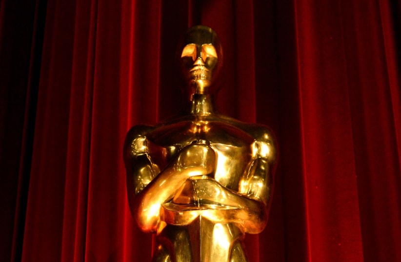  An Oscar statue is seen at the 86th Academy Awards nominee announcements in Beverly Hills, California. (photo credit: REUTERS/PHIL MCCARTEN)