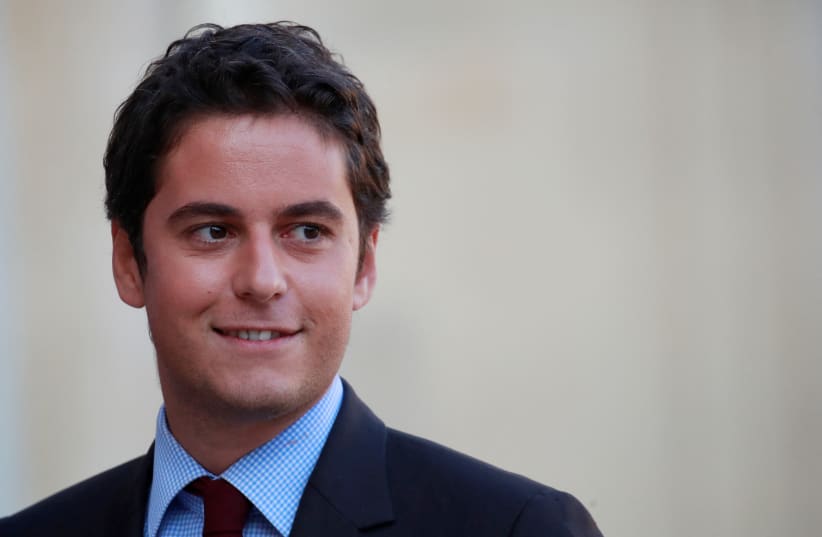 File Photo: Gabriel Attal, newly-named French Junior Education Minister, arrives to attend the weekly cabinet meeting at the Elysee Palace in Paris, France, October 17, 2018. (photo credit: REUTERS/GONZALO FUENTES/FILE PHOTO)