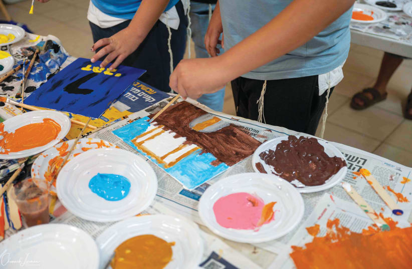  Children paint as a means to express their feelings during wartime (photo credit: Ophra Shoshtari)
