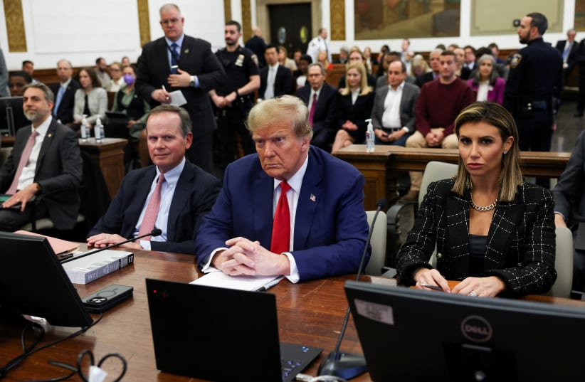  Former US President Donald Trump, with lawyers Christopher Kise and Alina Habba, attends the closing arguments in the Trump Organization civil fraud trial at New York State Supreme Court in the Manhattan borough of New York City, US, January 11, 2024. (photo credit: REUTERS/Shannon Stapleton/Pool)