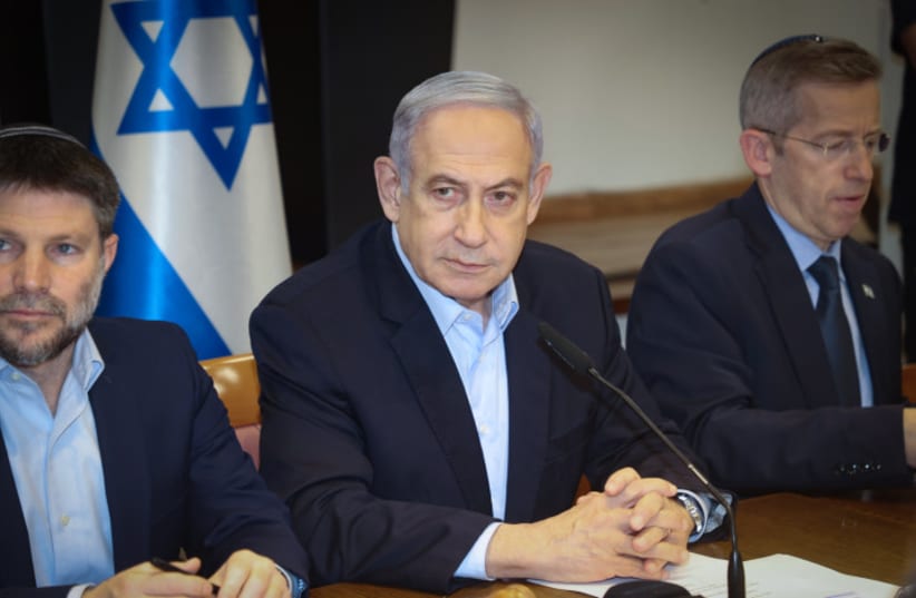  Israeli Prime Minister Benjamin Netanyahu leads a government conference at Hakirya base in Tel Aviv on January 7, 2024 (photo credit: YARIV KATZ /POOL)