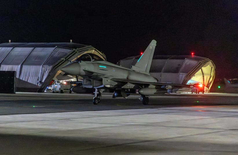  RAF Typhoon aircraft returns to RAF Akrotiri after striking military targets in Yemen during the U.S.-led coalition operation, aimed at the Iran-backed Houthi militia that has been targeting international shipping in the Red Sea, January 12, 2024. (photo credit: VIA REUTERS)