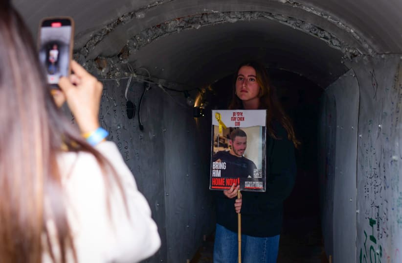 Families of Israelis held hostage by Hamas terrorists in Gaza standing outside a tunnel installation at Hostages Square in Tel Aviv on January 13, 2024 (photo credit: TOMER NEUBERG/FLASH90)