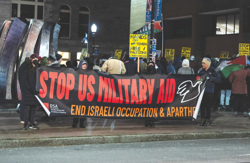  A PROTEST takes place, last Friday in Seattle, against Israel and in support of a ‘Free Palestine,’ following the US and British strikes in Yemen against Iran-backed Houthi rebels. (photo credit: David Ryder/Reuters)