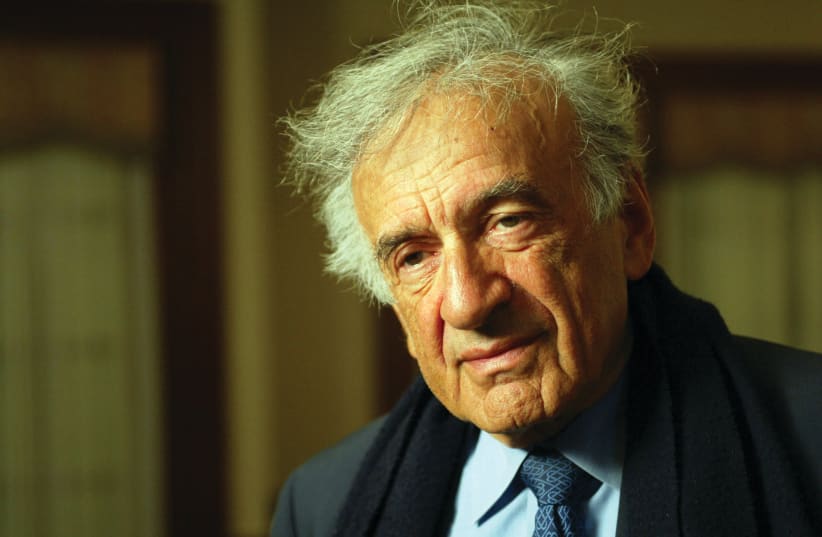 NOBEL LAUREATE, the late Elie Wiesel, speaks to a reporter in Washington in 2005. Years earlier, he said: ‘As a Jew, I need Israel. More precisely: I can live as a Jew outside Israel but not without Israel.’ (photo credit: JEFF CHRISTENSEN/REUTERS)